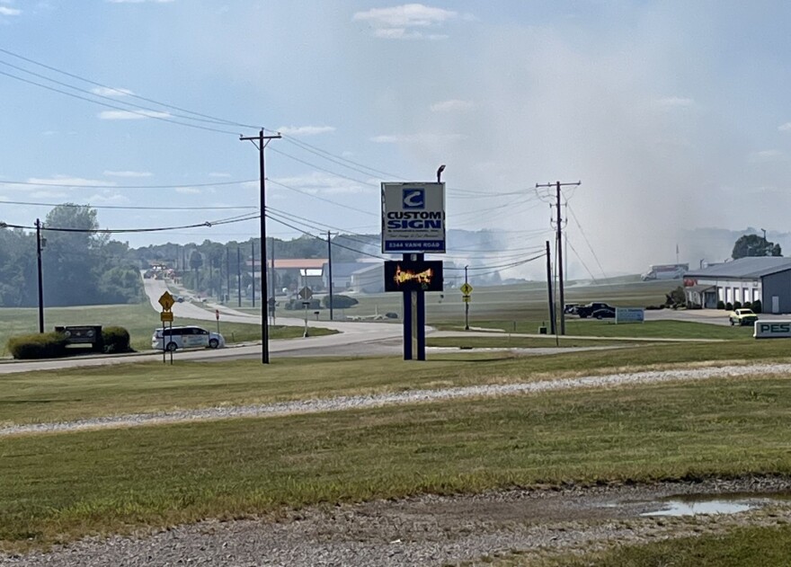 White smoke blows from a fire at PBBT Corporation off Vann Road in Newburgh, Sat. Sept. 6, 2005