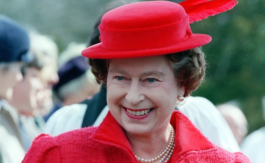 Considered a substitute for the royal crown, hats allow Queen Elizabeth II to be easily identified. As monarch over the past 50 years, the queen has worn about 5,000 hats. Here, she smiles as she leaves the Royal Chapel in Windsor Great Park, England, after attending morning prayers on April 20, 1986.