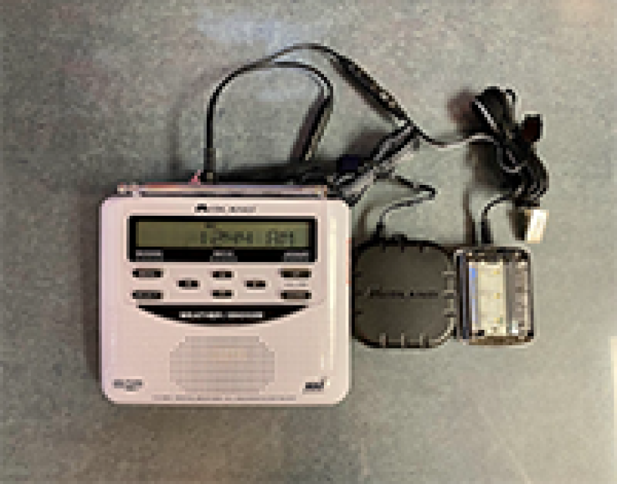 A weather radio with special attachments for the hearing impaired