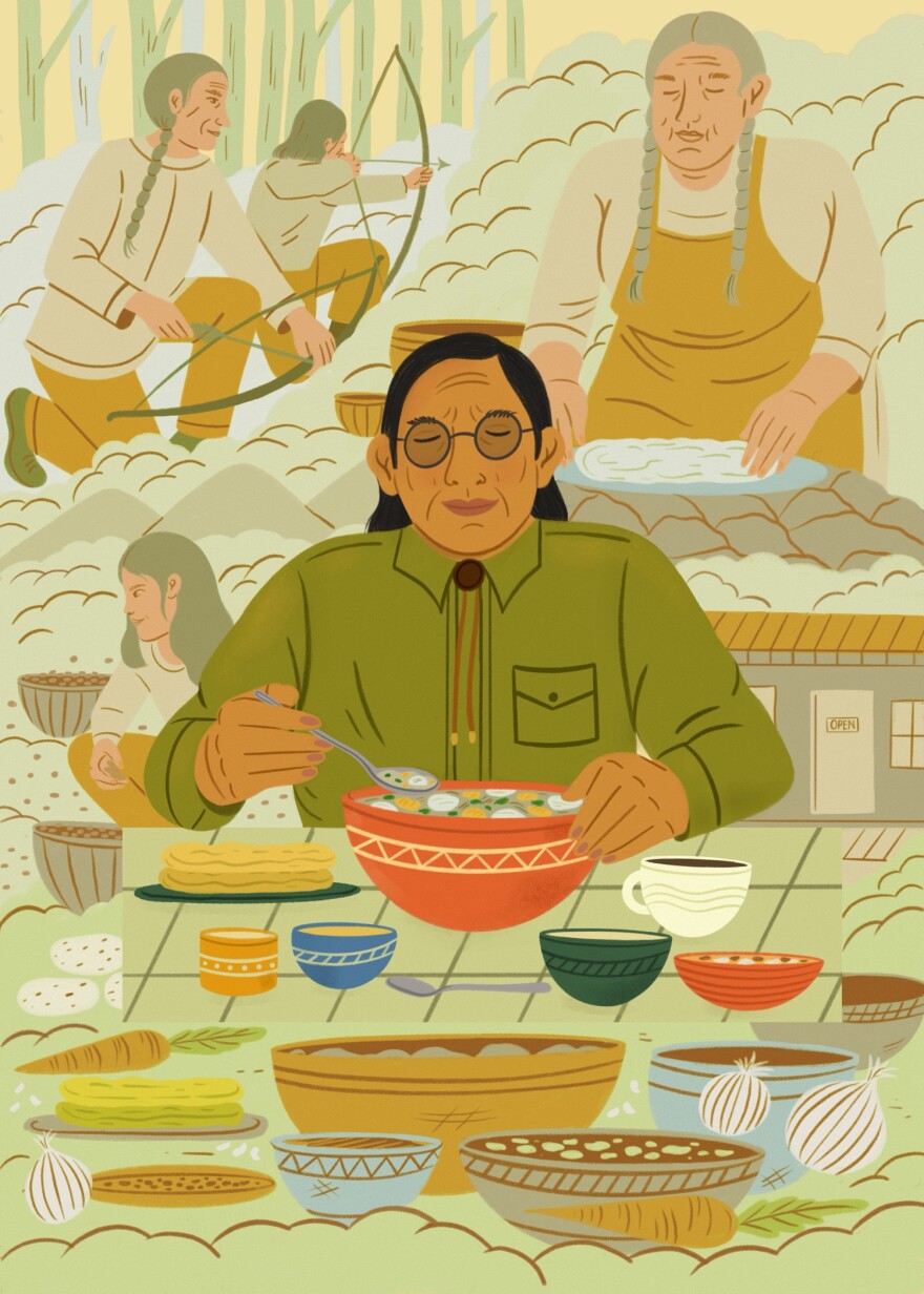 An Indigenous man eats a bowl of soup, surrounded by members of his community sourcing food and cooking it