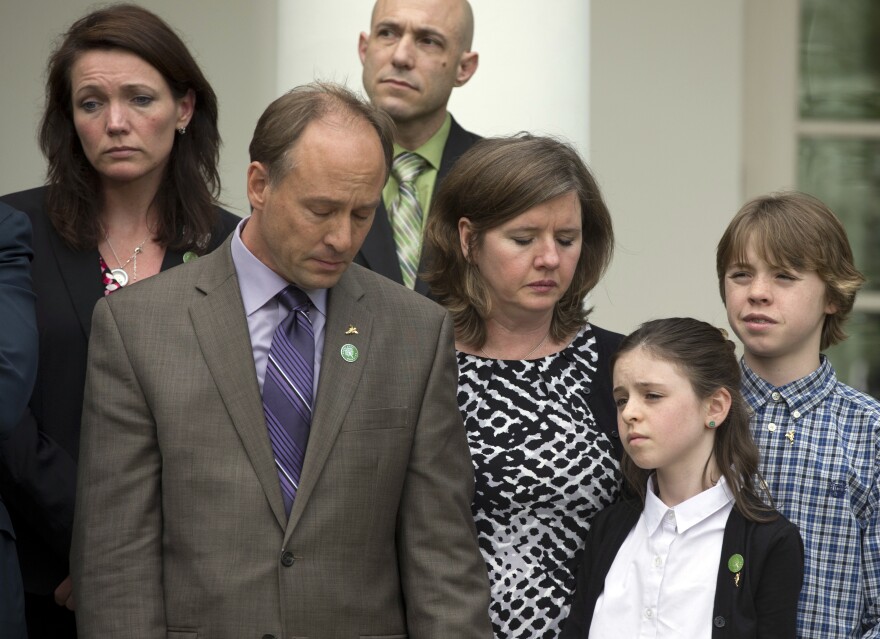 Mark and Jackie Barden (front) lost their 7-year-old son, Daniel, in the Sandy Hook Elementary School shooting in Newtown, Conn., in December. On Wednesday, they stood with their surviving children, Natalie and James, in the White House Rose Garden with President Obama and other Newtown parents after the defeat of a bill to expand background checks on guns.