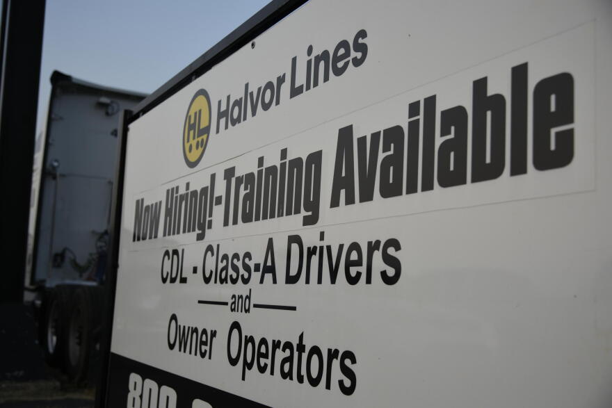 A trucking company in South Bend advertises training available to help new hires get CDL licenses.