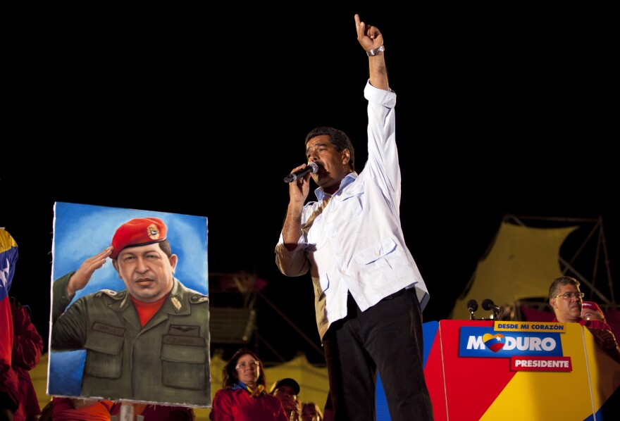 Venezuela's acting president, Nicolas Maduro, speaks during his closing campaign rally in Caracas on Thursday. The hand-picked successor of Hugo Chavez faces opposition candidate Henriques Capriles in snap presidential elections on April 14.