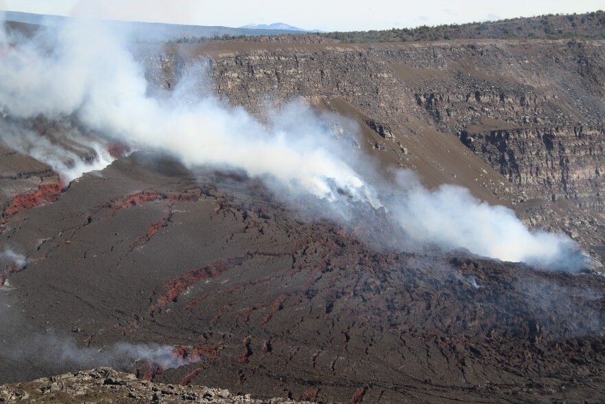 Volcanic gas seeps out of cracks near eruptive vents in Halemaʻumaʻu on July 17, 2025.