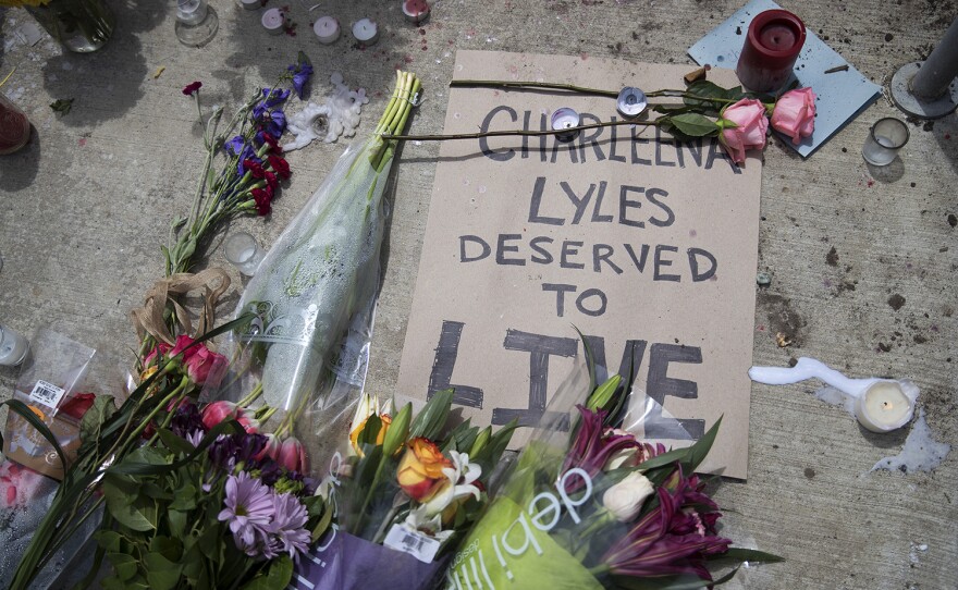 A memorial for Charleena Lyles is shown outside of Solid Ground Brettler Family Place on Monday, June 19, 2017.