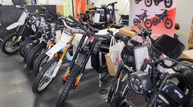 Ocatavio Hoyos sells e-bikes at his Orlando shop, Eccentric Cycle.