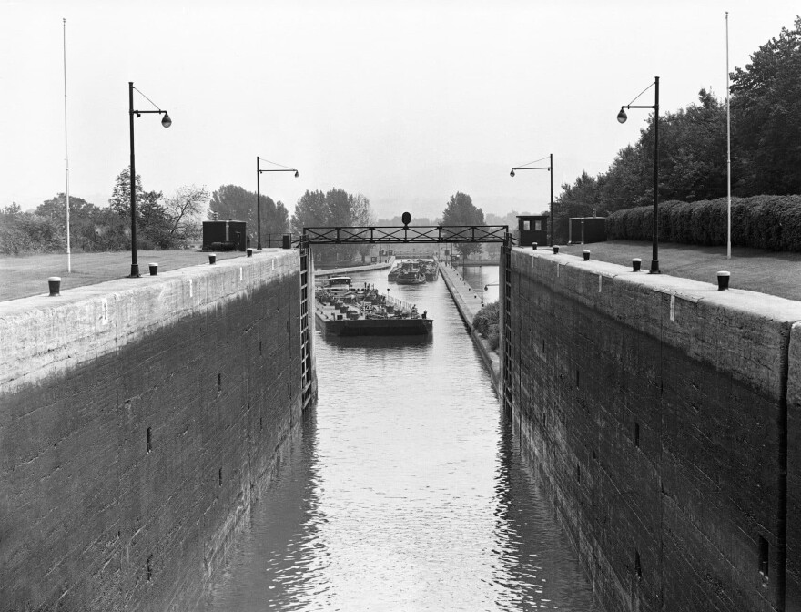 An eastbound tanker, in foreground, prepares to pass a westbound one, background, after being released from a lock in the Erie Canal, N.Y., Sept. 4, 1947. (AP Photo)