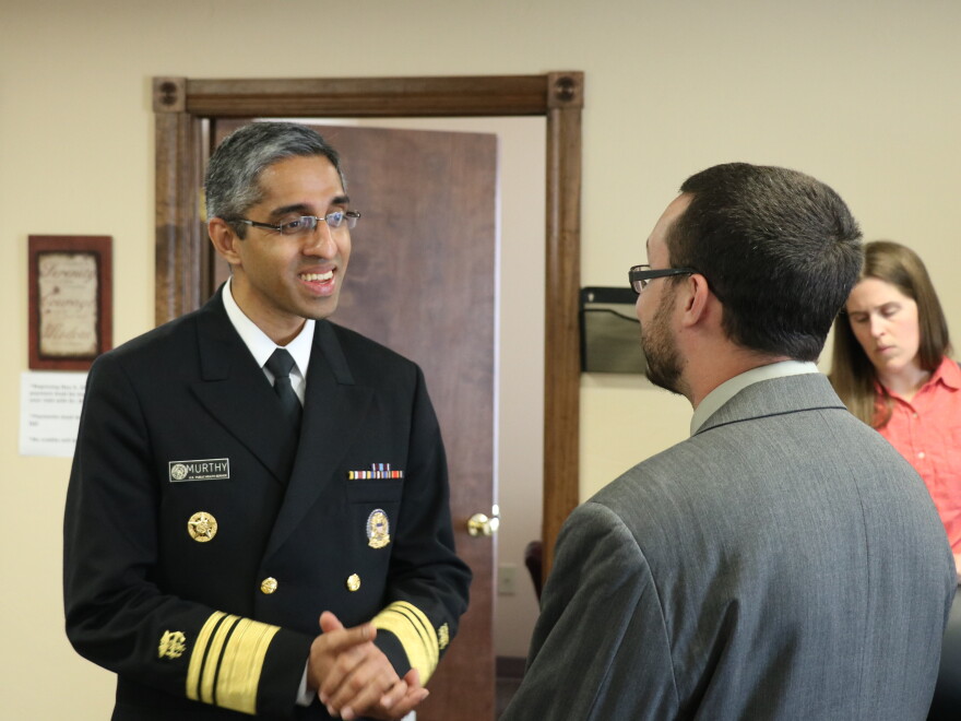 U.S. Surgeon General Vivek Murthy talks with recovering addict Justin Zagaruyka on Monday at Catalyst Behavioral Services in Oklahoma City.