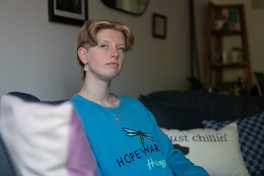 Lilo Baurer, who attended Calo in 2017 and 2018, poses for a portrait Thursday, May 21, 2026, at their apartment in Iowa City, Iowa.