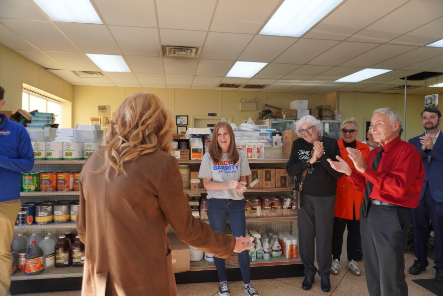 Stacy Garrity (left) greets a small group of supporters inside Kepner’s Grandview Meats in Altoona. 