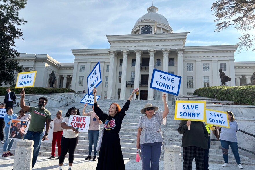 Protestors gather outside the Alabama Capitol in Montgomery, Ala., Monday, March 9, 2026 urging Gov. Kay Ivey to grant clemency to Sonny Burton. (AP Photo/Kim Chandler)