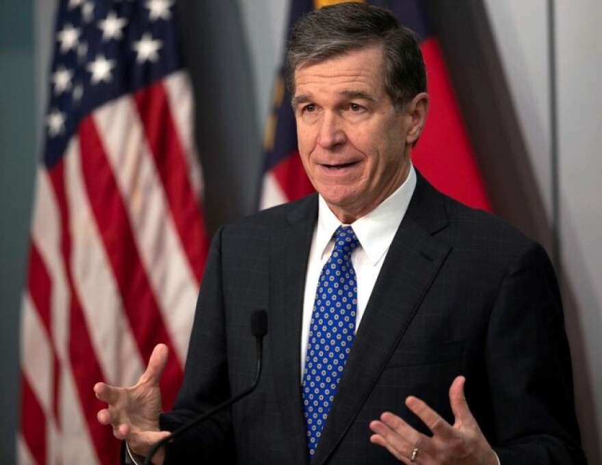 Then-Gov. Roy Cooper speaks during a 2021 news conference in Raleigh.
