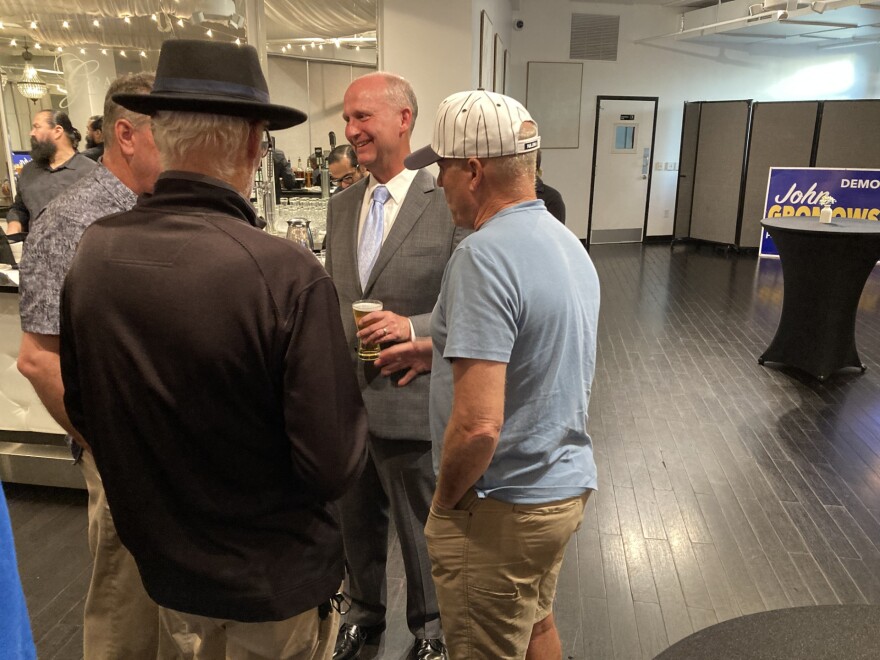 John Gromowsky, a Democratic candidate for Jackson County Prosecutor, meets with his supporters at the Grand Street Cafe Tuesday night. He lost the race to Melesa Johnson, Mayor Quinton Lucas's director of public safety.