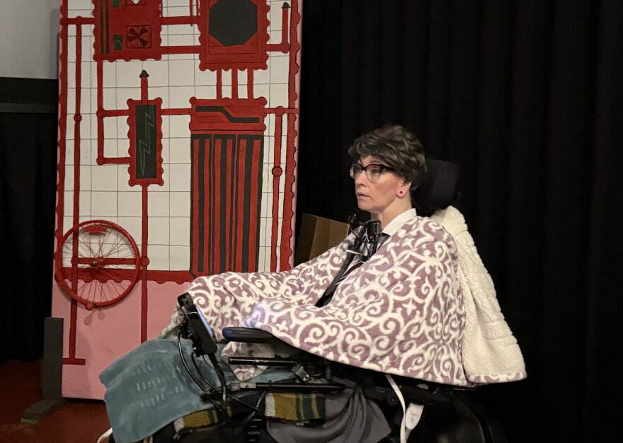 Maggie Winston prepares to play Dr. Everett Scott in a shadow cast performance of "The Rocky Horror Picture Show" on Thursday, Oct. 29, 2026 near Soldotna, Alaska.