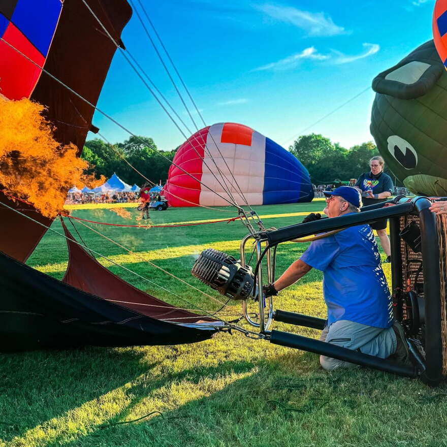 Bill Broker inflates a hot-air balloon at the 2024 Plano Balloon Festival.