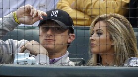 Johnny Manziel and his then-girlfriend Colleen Crowley at a baseball game in Arlington, Texas, on April 14, 2015.