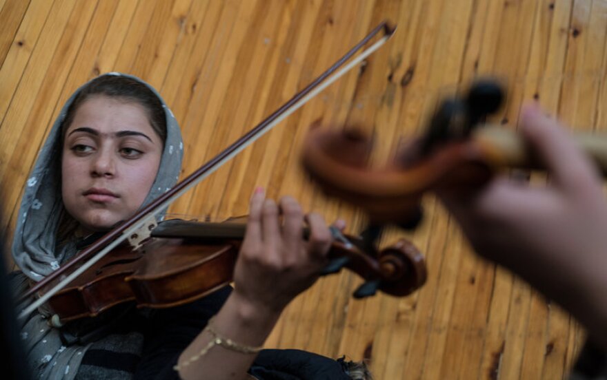 Marjan practices at the Afghanistan National Institute of Music in Kabul.