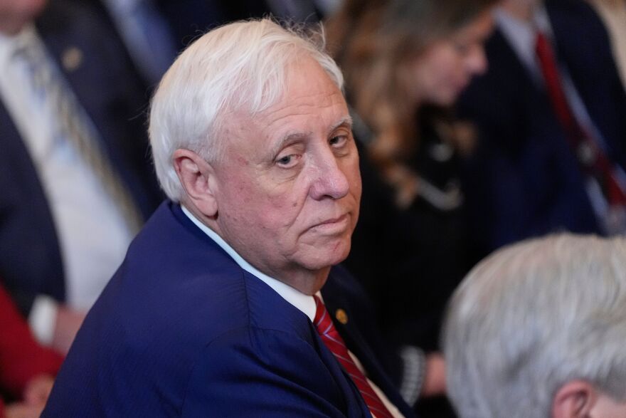 Sen. Jim Justice, R-W.Va., listens as President Donald Trump speaks during an event on energy production in the East Room of the White House, April 8, 2025, in Washington.