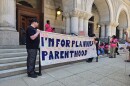 Supporters of reproductive rights rallied on the steps of the federal courthouse in Milwaukee in June 2025, after the US Supreme Court ruled that Planned Parenthood lacked the legal standing to challenge South Carolina's decision to exclude the organization from its Medicaid program. This decision allowed red states to restrict Medicaid funds to Planned Parenthood.