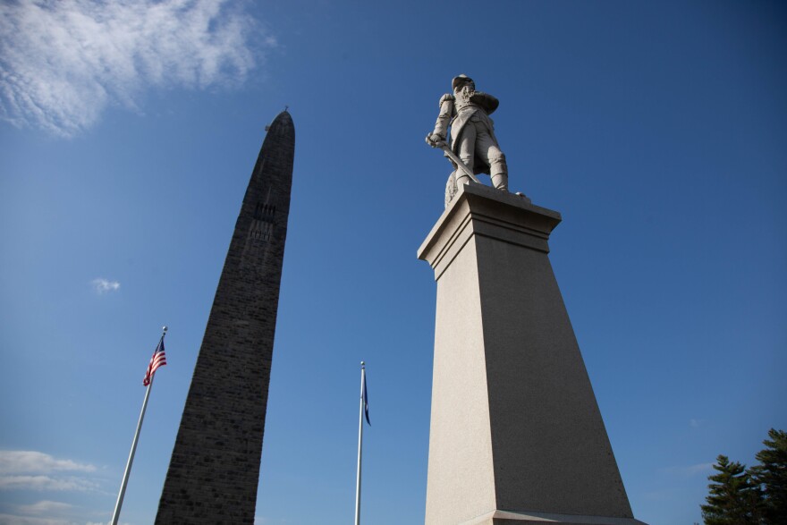 The Bennington Monument against a blue sky.