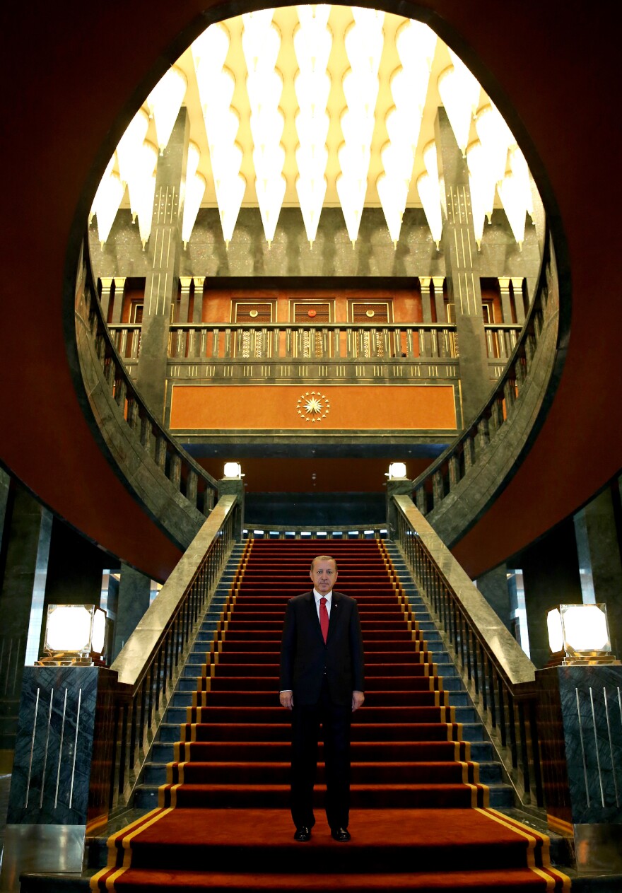 Erdogan stands in the newly built presidential palace in Ankara before the start of the 91st anniversary celebrations of the Turkish Republic on Oct. 29.