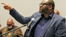 President of the NAACP Baton Rouge chapter, Eugene Collins, speaking at a press conference for organizations protesting proposed congressional and state legislative maps.