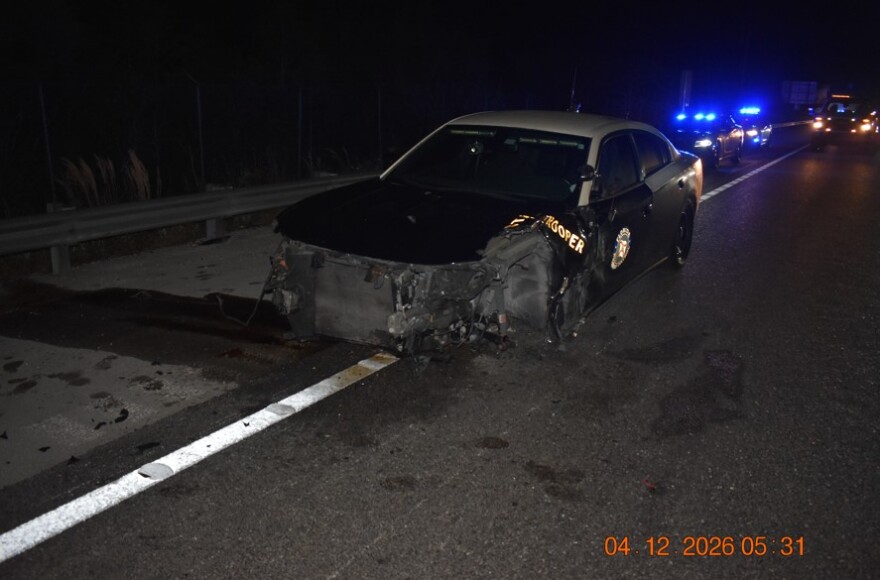 A Florida Highway Patrol trooper was seriously injured by debris after another driver hit his parked patrol vehicle along I-75 Sunday morning. The driver, Jonathan Munas, 32, of Sarasota, was charged with driving under the influence.