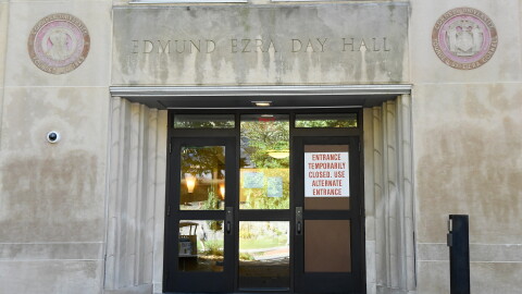 A sign is displayed on a door at Day Hall after damage and graffiti overnight was cleaned up at Cornell University, Monday, Oct. 5, 2026, in Ithaca, N.Y. 