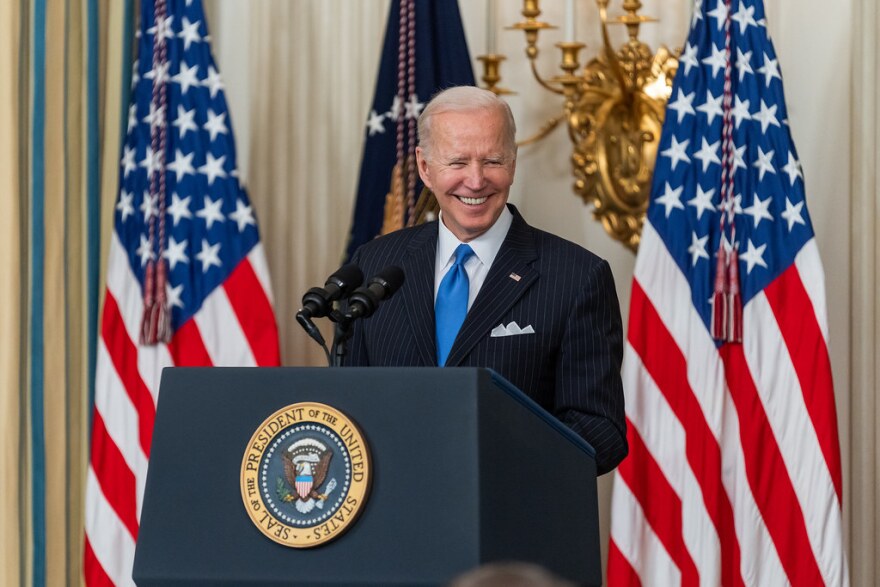 Pres. Joe Biden speaking on April 6, 2022, in the State Dining Room of the White House.