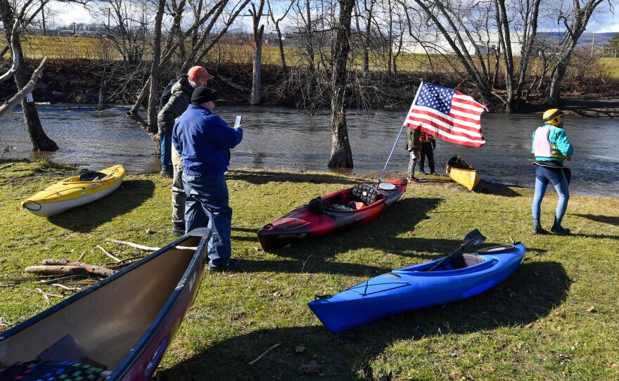 Paddlers wait for others to float into Sweeney's Beach during the LRCA's ShiverFest on Saturday, Jan. 13.