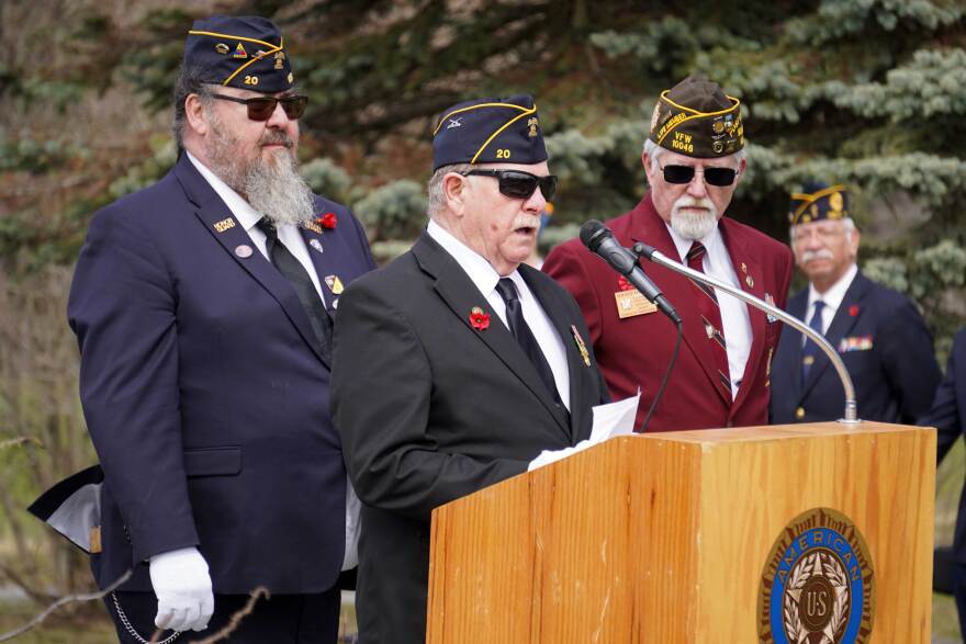Mike Meredith, chaplain of the American Legion Post 20, recites "In Flander's Fields" during a Memorial Day ceremony at Leif Hansen Memorial Park in Kenai, Alaska, on Monday, May 25, 2026.