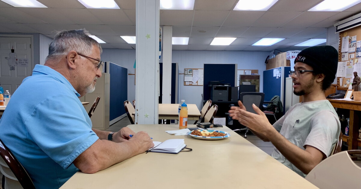 Photo: whro.org Conrad "Connie" Agresti (left), a member of the task force examining safety issues in Virginia Beach, speaks with Pheonix