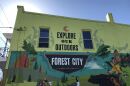 Mural on the exterior of OUR Community Center building in Forest City.