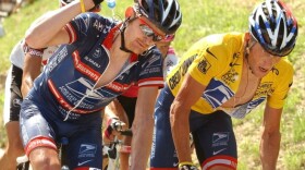 Floyd Landis, left, and then-teammate Lance Armstrong during the 2004 Tour de France.