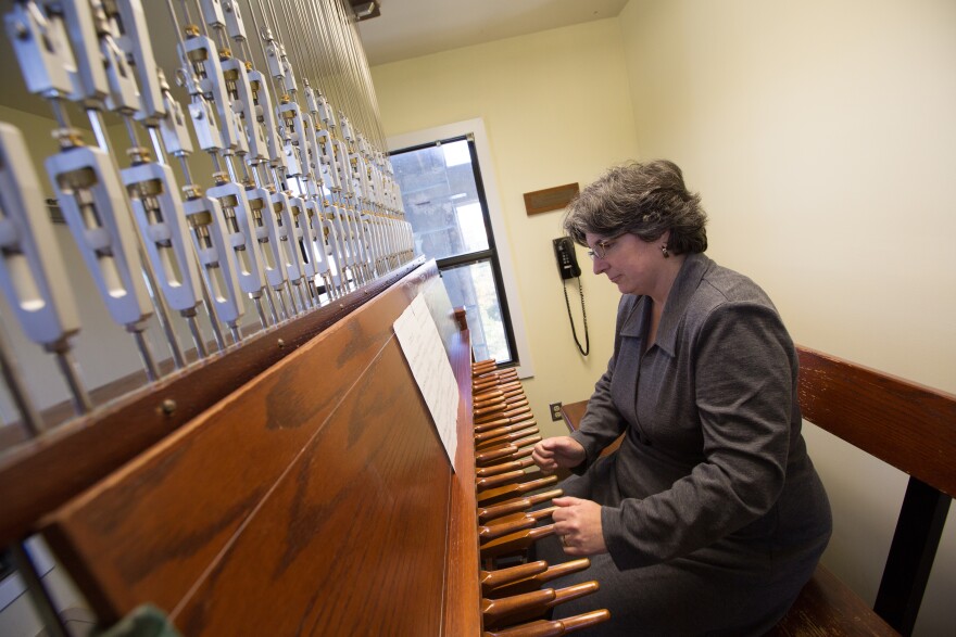 Carillon player Liz Berghout playing the carillon in the campanile