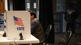 A person votes at the World War I Museum and Memorial on April 8, 2025
