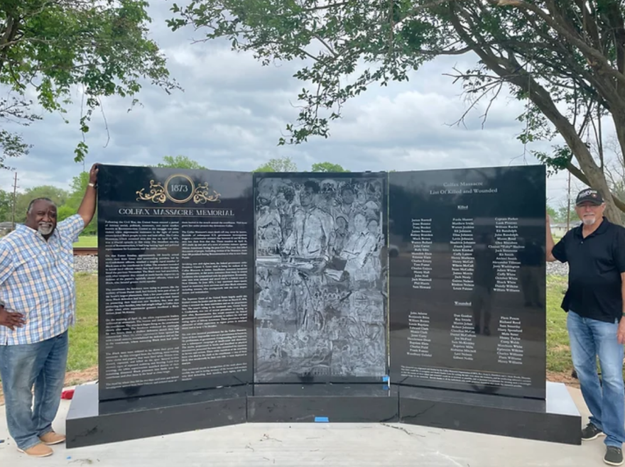 Rev. Avery Hamilton (left) and Dean Avery stand with new memorial for the victims for the Colfax Massacre of 1837