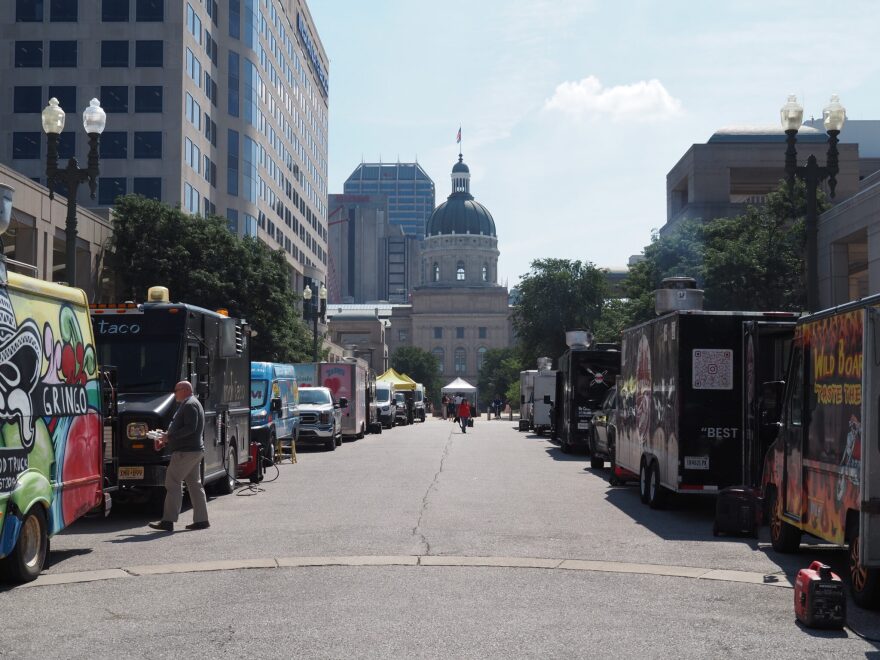 Trucks and other vendors line the street for the Statehouse Market on Thursday, July 16, 2026.