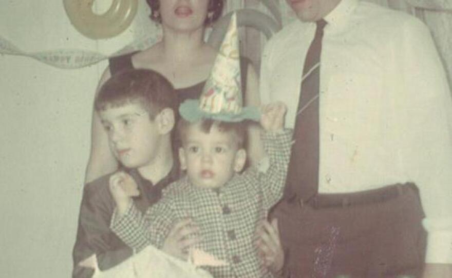 Blanco, aka "Little Riqui," celebrates his third birthday with his brother Caco; his mother, Geysa; and his father, Carlos — all dressed in their 1970s best.