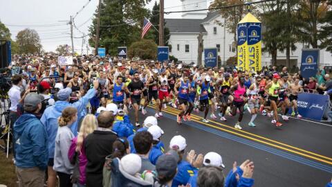Runners take off from Hopkinton in the 2021 Boston Marathon. (Robin Lubbock/WBUR file)