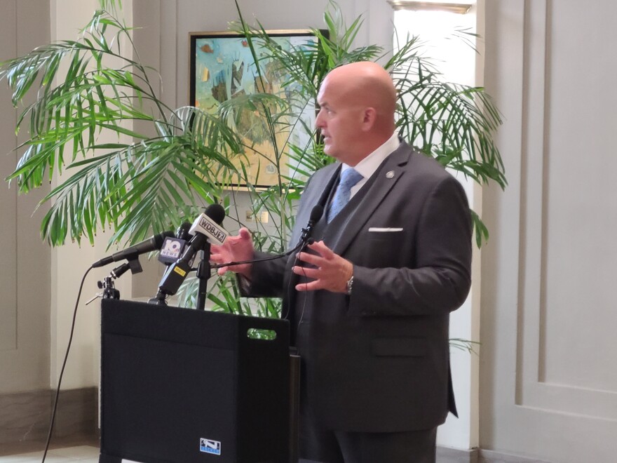 Roanoke Police Chief Scott Booth takes questions just after being sworn in