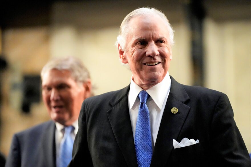 FILE - South Carolina Gov. Henry McMaster greets lawmakers ahead of his State of the State address on Wednesday, Jan. 19, 2022, in Columbia, S.C. Democrats in South Carolina get another shot at loosening the firm grasp Republican have on statewide politics as voting ends Tuesday for the 2022 elections. But it's likely to be a tough fight.(AP Photo/Meg Kinnard, File)