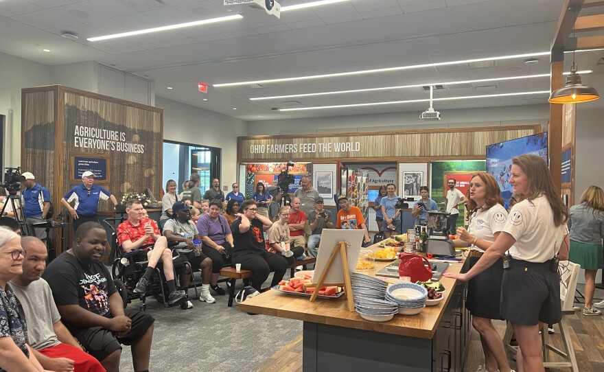 The Ohio Department of Developmental Disabilities leads a cooking demo in the overflowing Ohio Proud store 