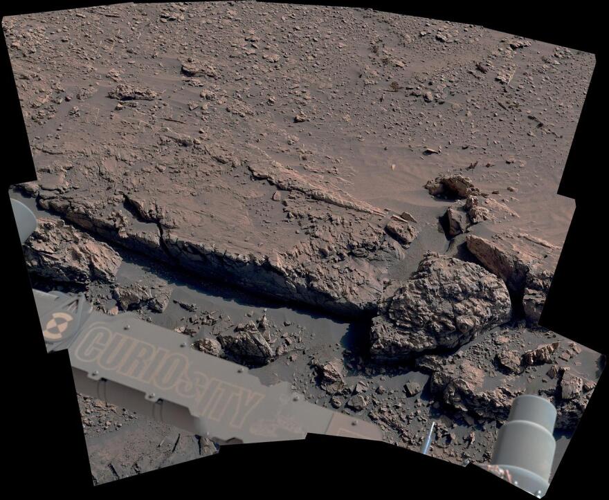 The curblike ridge in this view is part of a series of crisscrossing features that form what's called a boxwork pattern. NASA's Curiosity Mars rover captured the image with its Mast Camera, or Mastcam, on May 16, 2025, the 4,541st Martian day, or sol, of the mission. This panorama was stitched together from 15 individual images. The color in these images has been adjusted to match the lighting conditions as the human eye would see them on Earth. When viewed from space, the boxwork patterns look a bit like spiderwebs. They have fascinated scientists since before Curiosity's 2012 landing on the Red Planet and are believed to have formed from groundwater trickling through rock cracks billions of years ago. Minerals left behind by the water hardened like cement within the rock; after eons of sandblasting by wind, the rock was carved away, revealing networks of resistant ridges within.