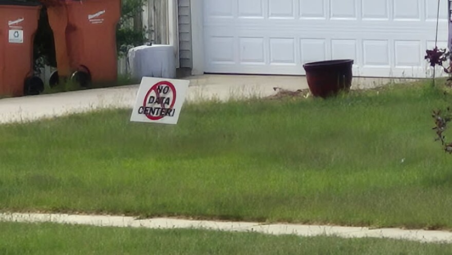 A "No Data Center" sign in front of a home