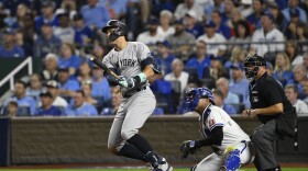 New York Yankees' Aaron Judge doubles during the sixth inning in Game 4 of an American League Division baseball playoff series against the Kansas City Royals Thursday, Oct. 10, 2024, in Kansas City, Mo. (AP Photo/Reed Hoffmann)