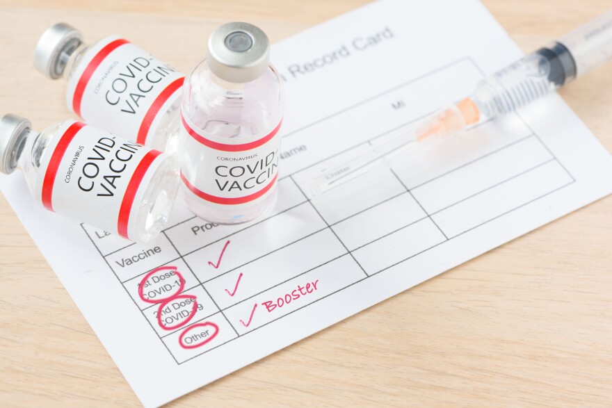 Vaccination,Record,Card,Showing,Booster,Dose,Of,Covid-19,Vaccine.,The
