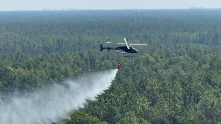 Michigan State Police helicopter training with a Bambi Bucket