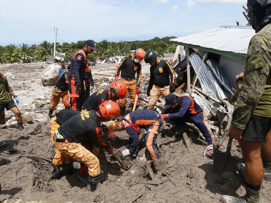 Corpse Disaster More than 100 people are dead and dozens are missing in storm-ravaged ...