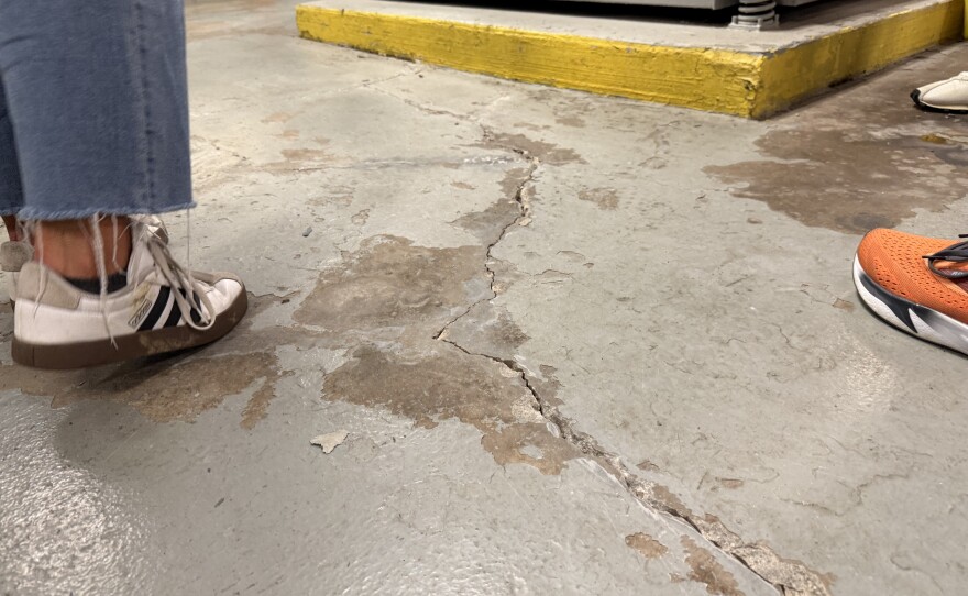 Persistent cracks in the concrete floor are noticeable on the top floor of the Franklin County Municipal Court building.